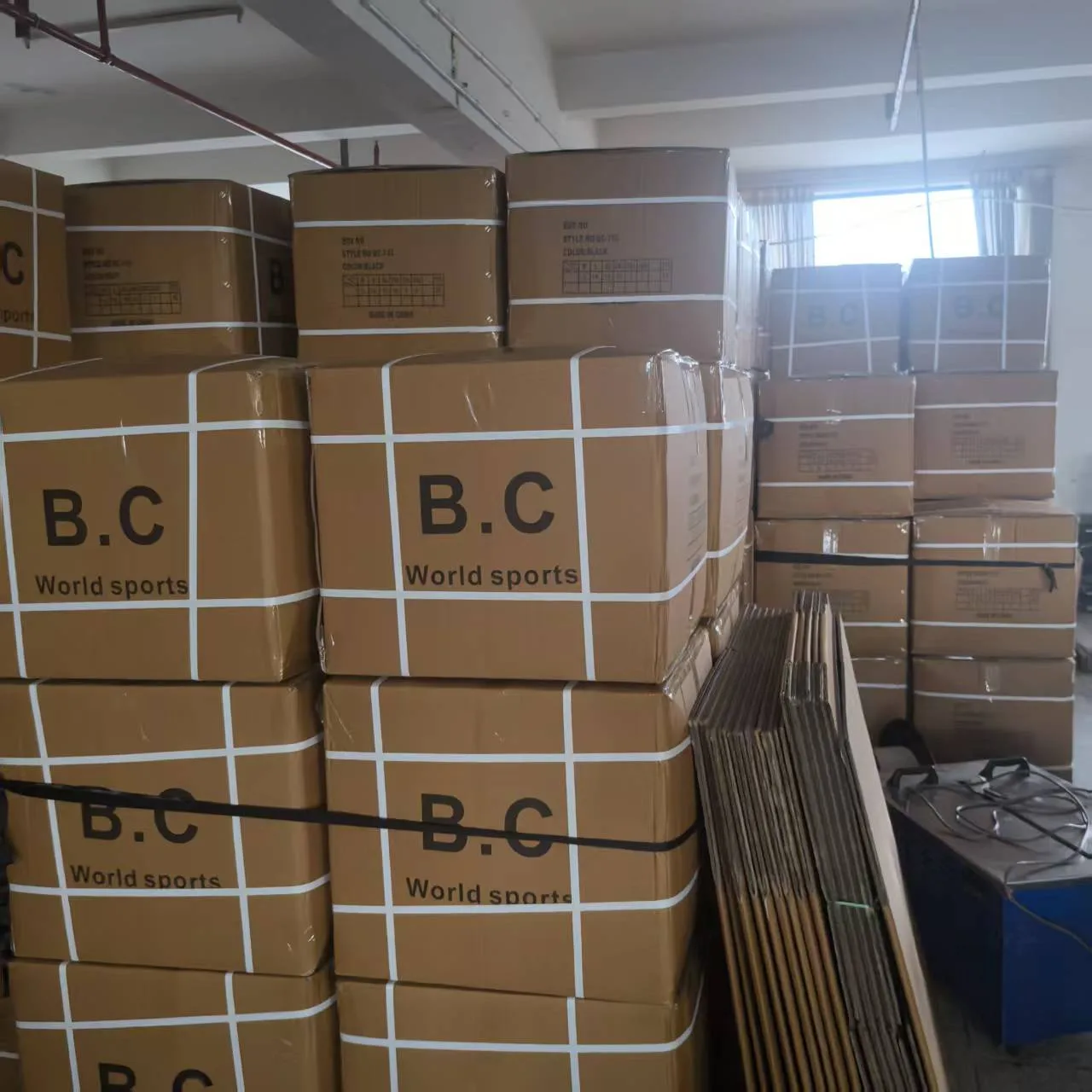 Packed export cartons in the factory staging area