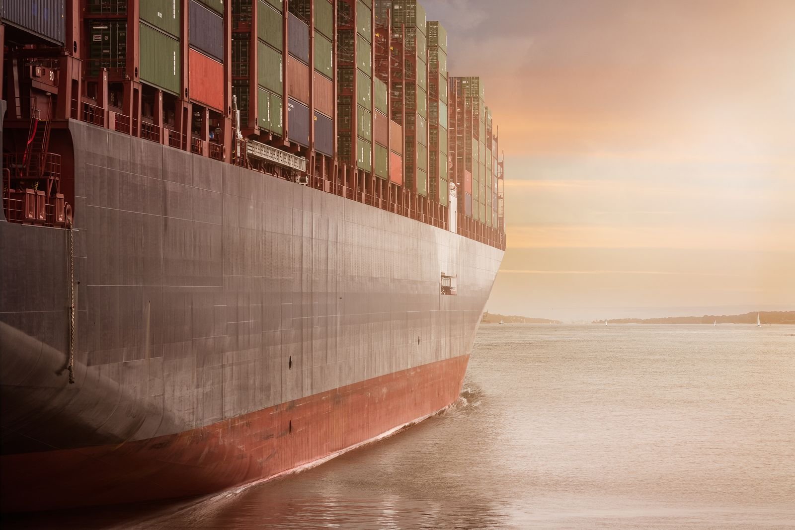Container ship carrying export cargo toward port