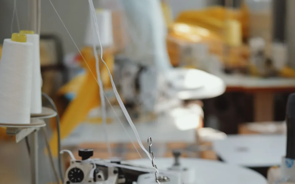 Industrial sewing machines arranged for apparel production